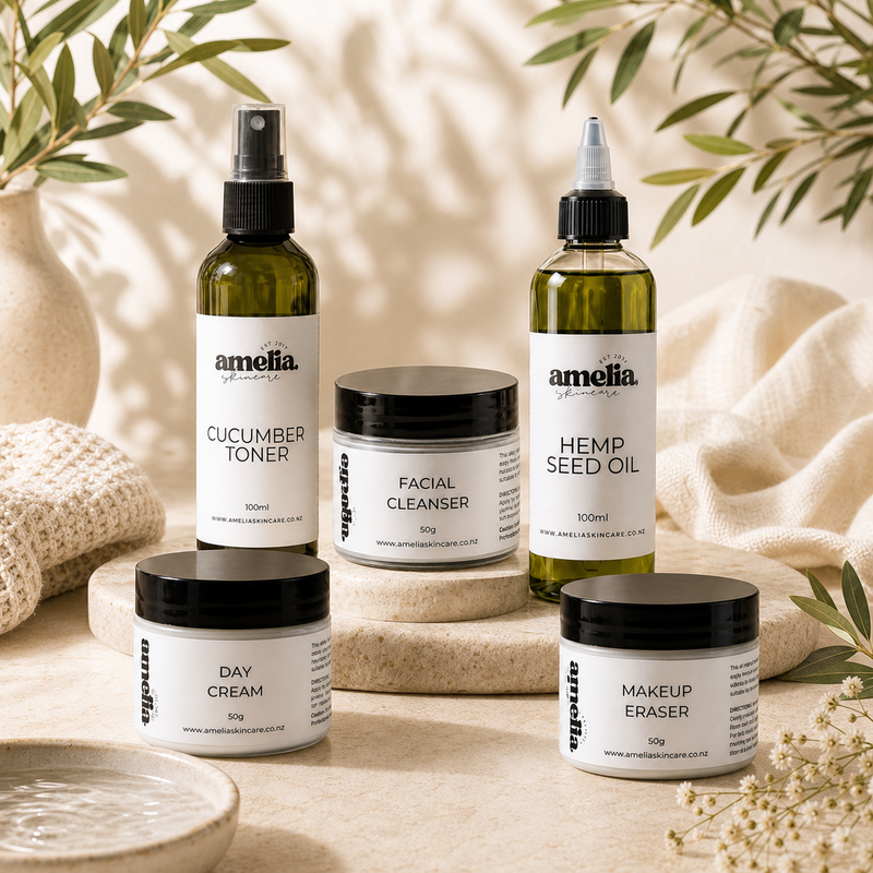 Amelia Skincare collection with cleanser, creams, toner, makeup balm, and hemp seed oil